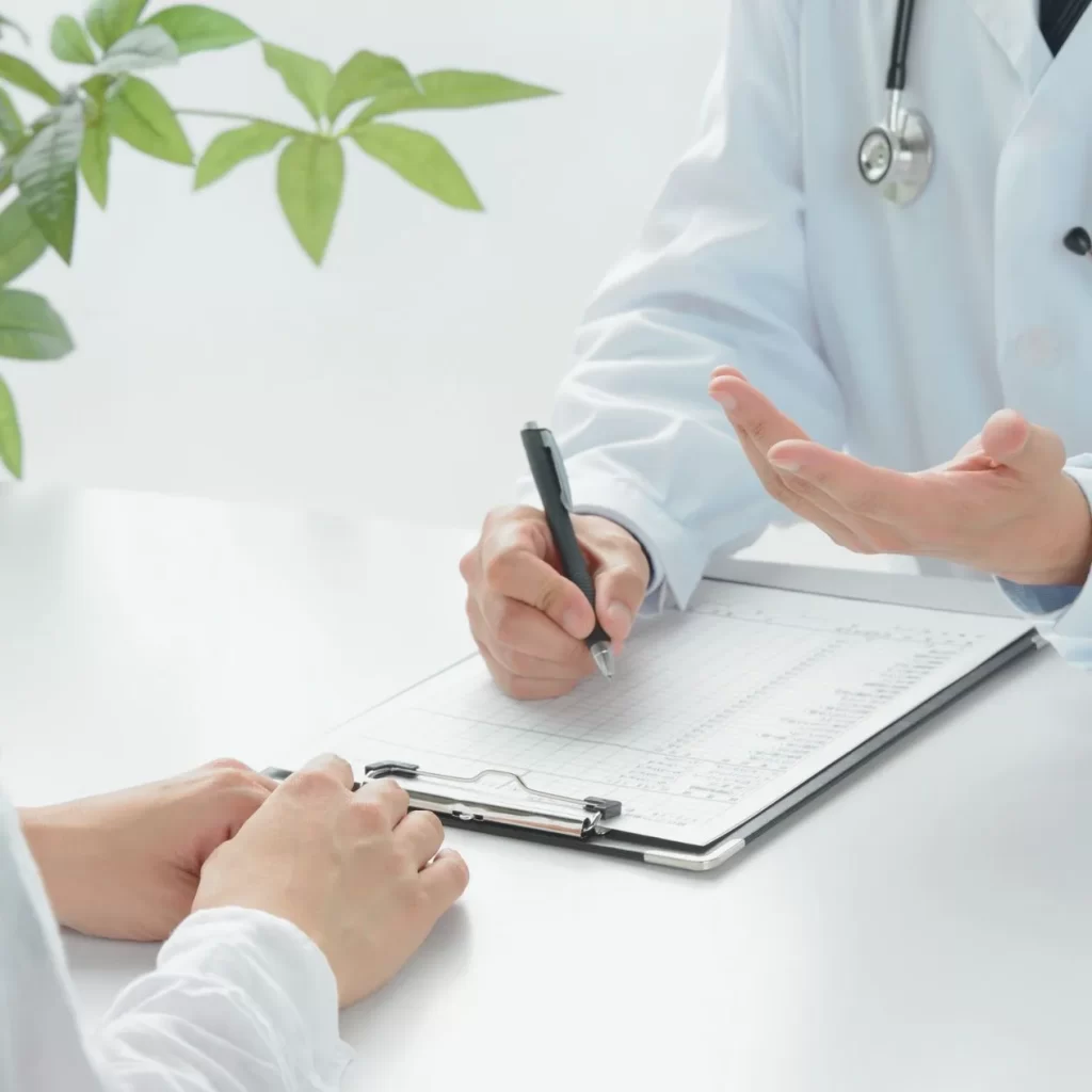 A woman receiving counselling from a mental health professional.