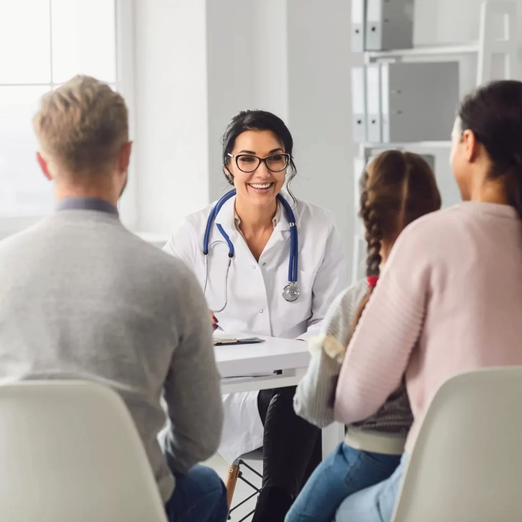 A mother and her daughter paying a visit to their family doctor, who is open to accepting new patients.