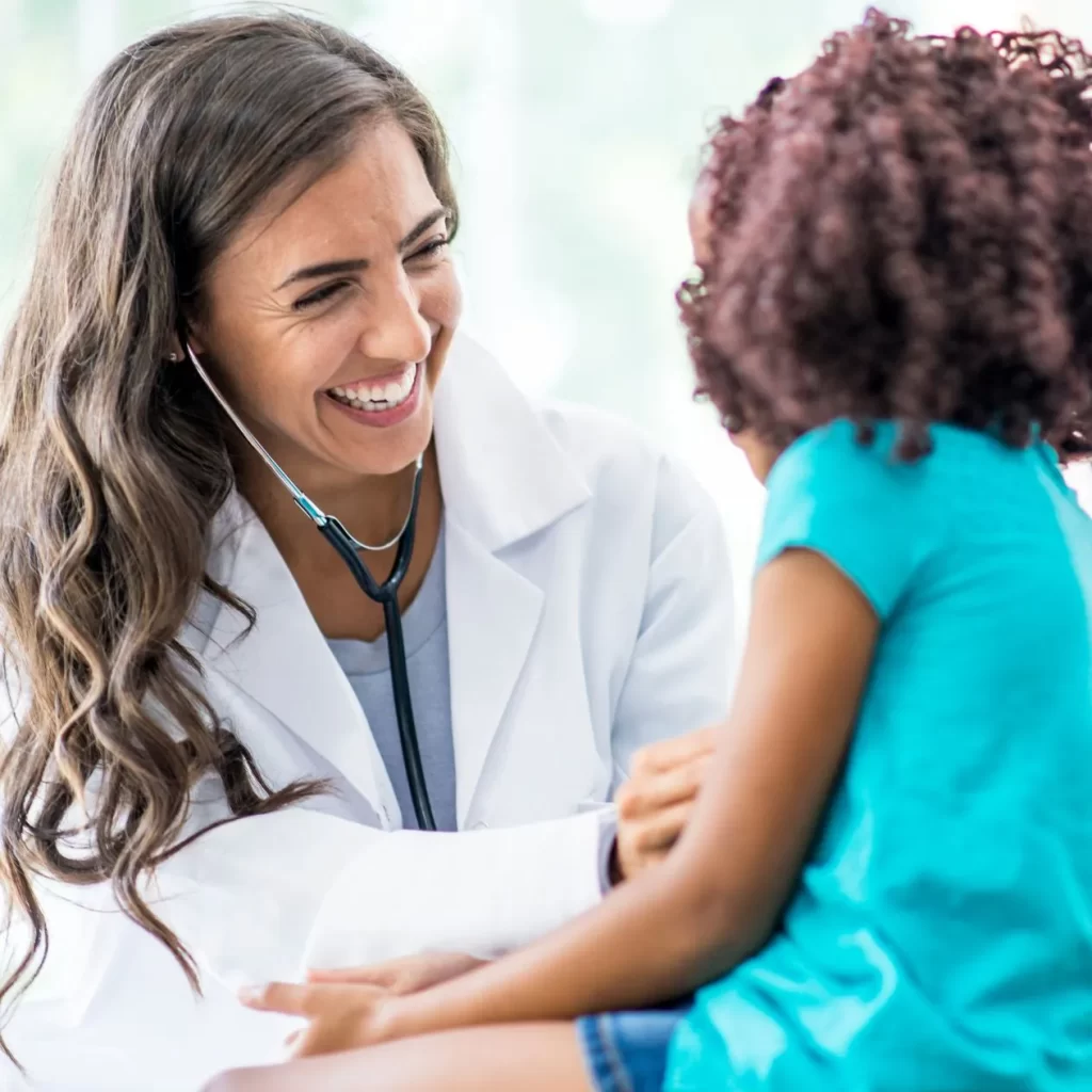 Doctor checking a child during an urgent medical care appointment