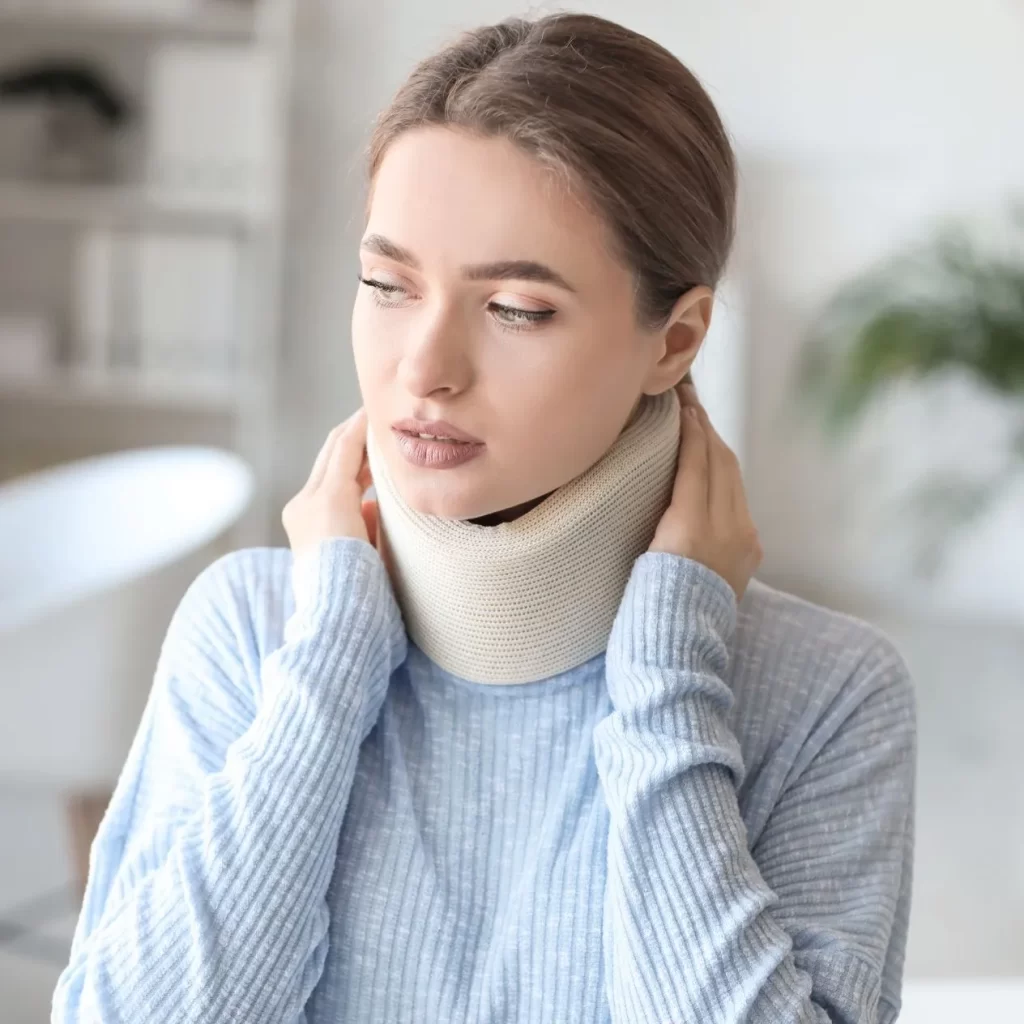 Neck brace on a woman for rehabilitation after an injury