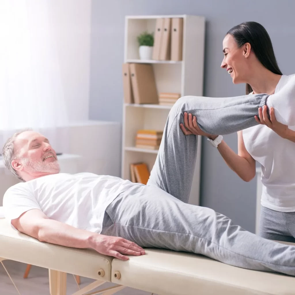 Experienced physiotherapist treating a patient with an injury