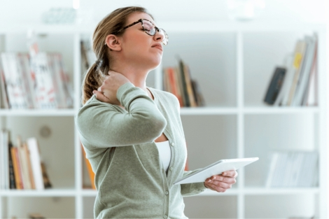 lady with neck strain at home