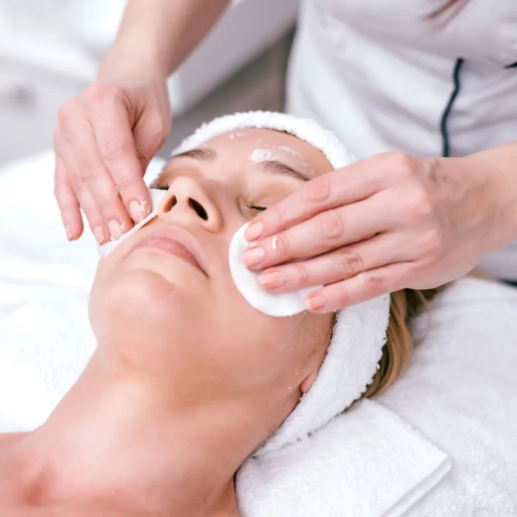 woman receiving professional glass skin facial