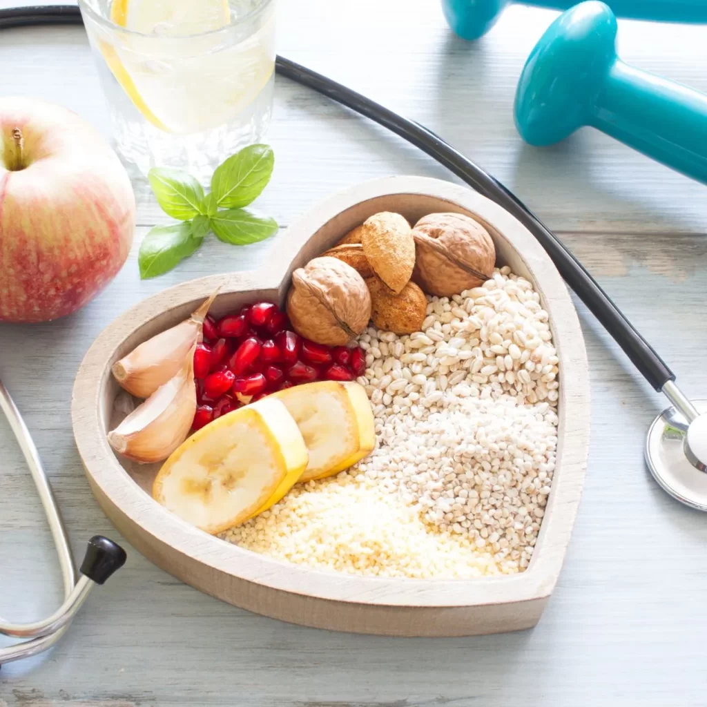 Bowl of healthy foods and a stethoscope