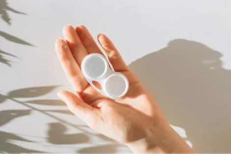 contact lens carrying case in a hand