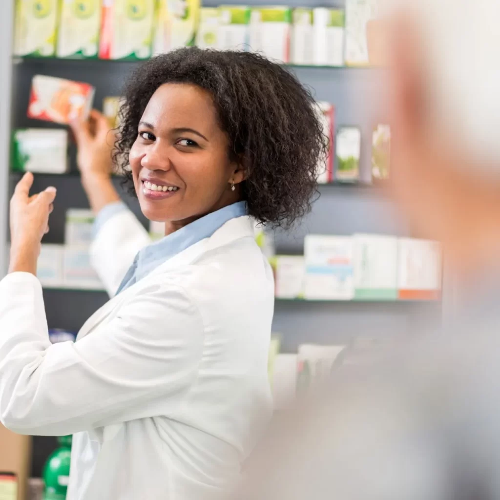 pharmacist reviewing medication for patient