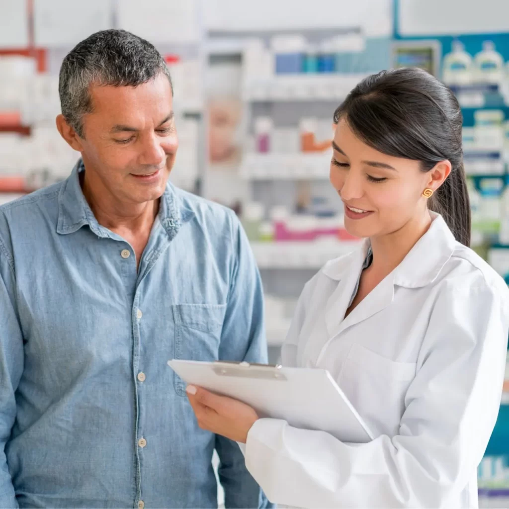 pharmacy staff creating a prescription for a patient