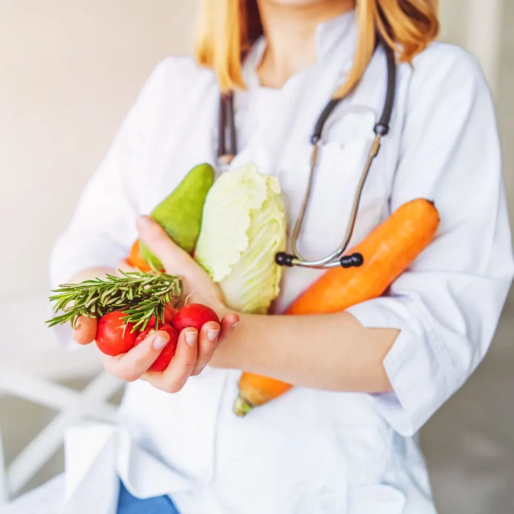 registered dietitian holding healthy foods