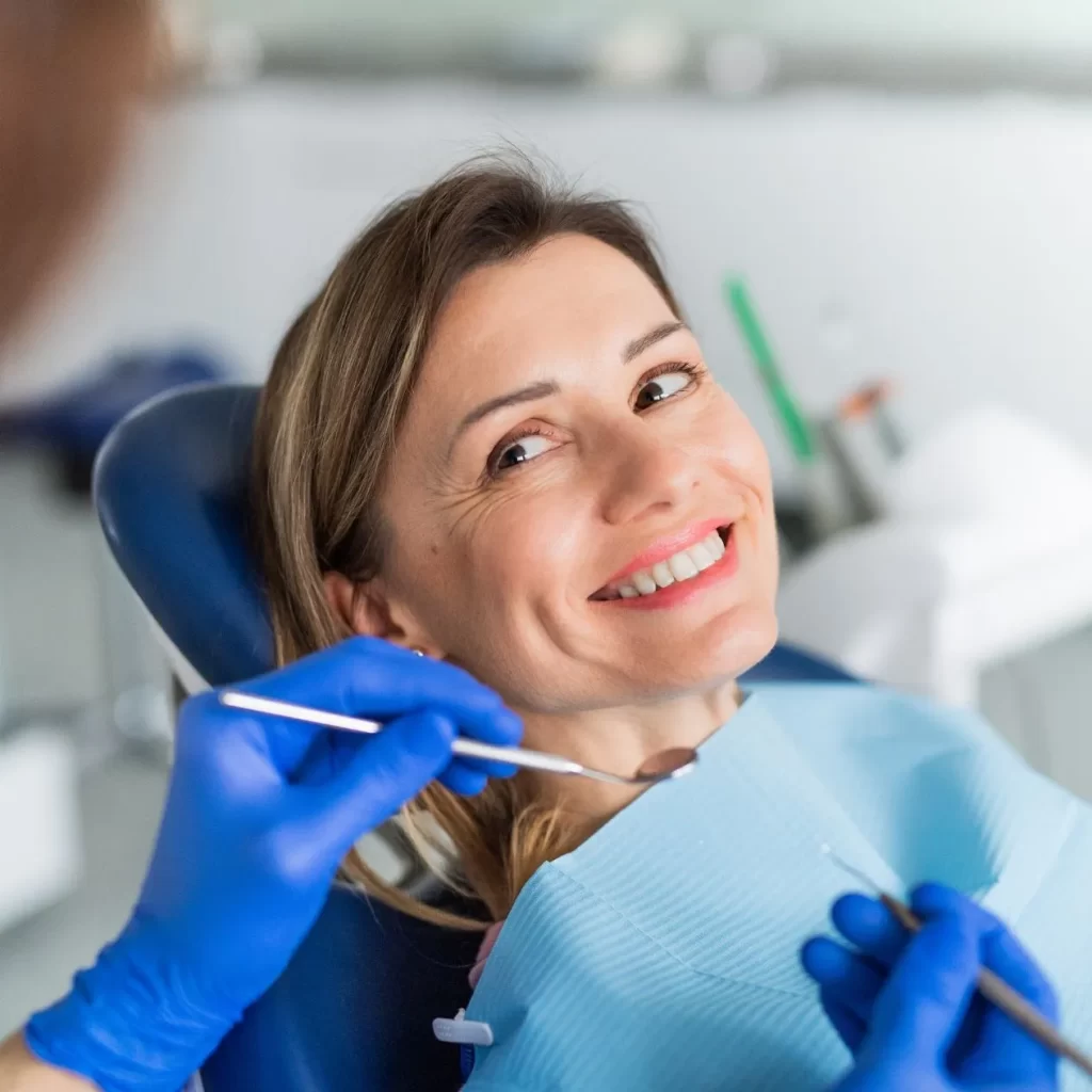 woman visiting a cosmetic dentist for his teeth