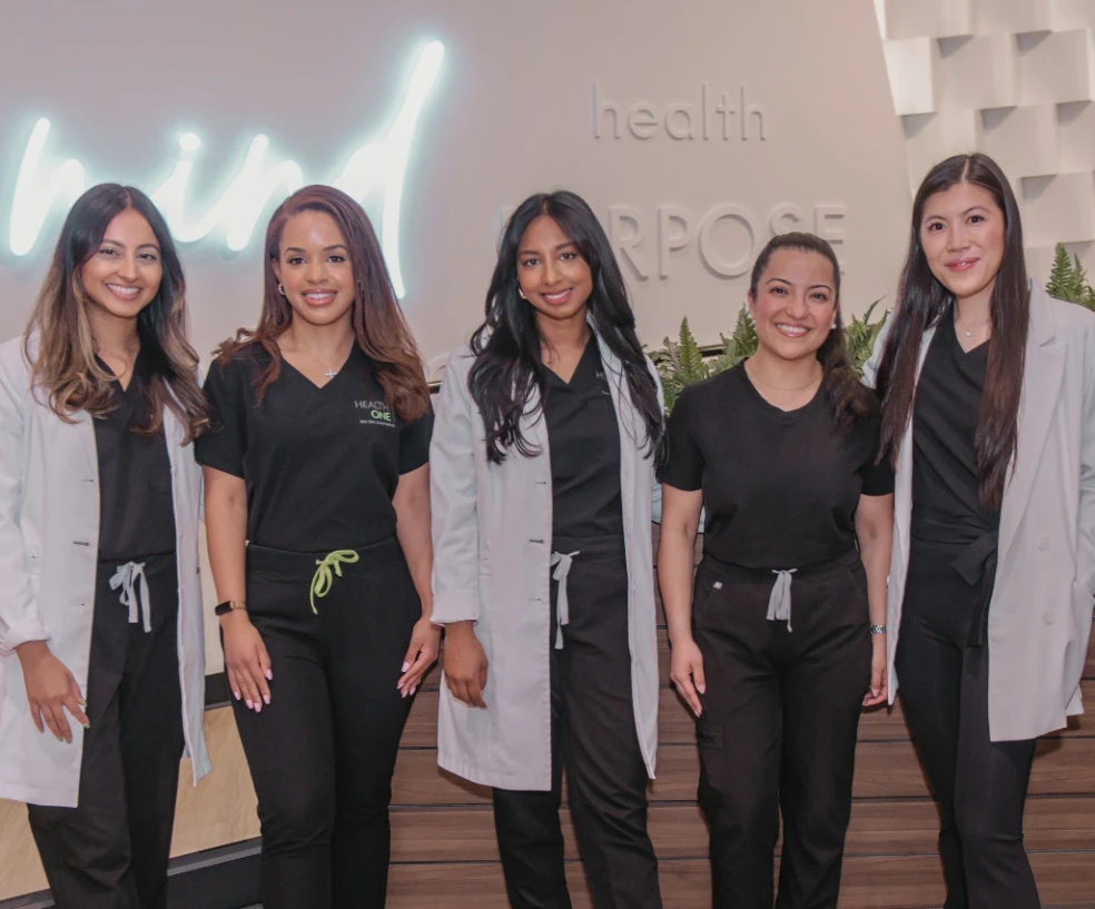 healthone nurses and doctors standing posing inviting you to join the team