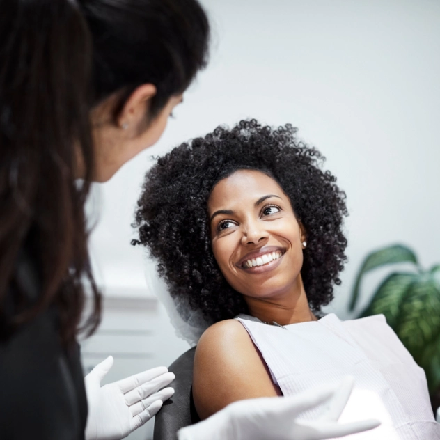 woman on dentist chair that accepts cdcp