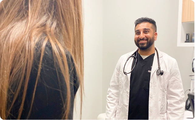 doctor patiently listening to a patient's concerns