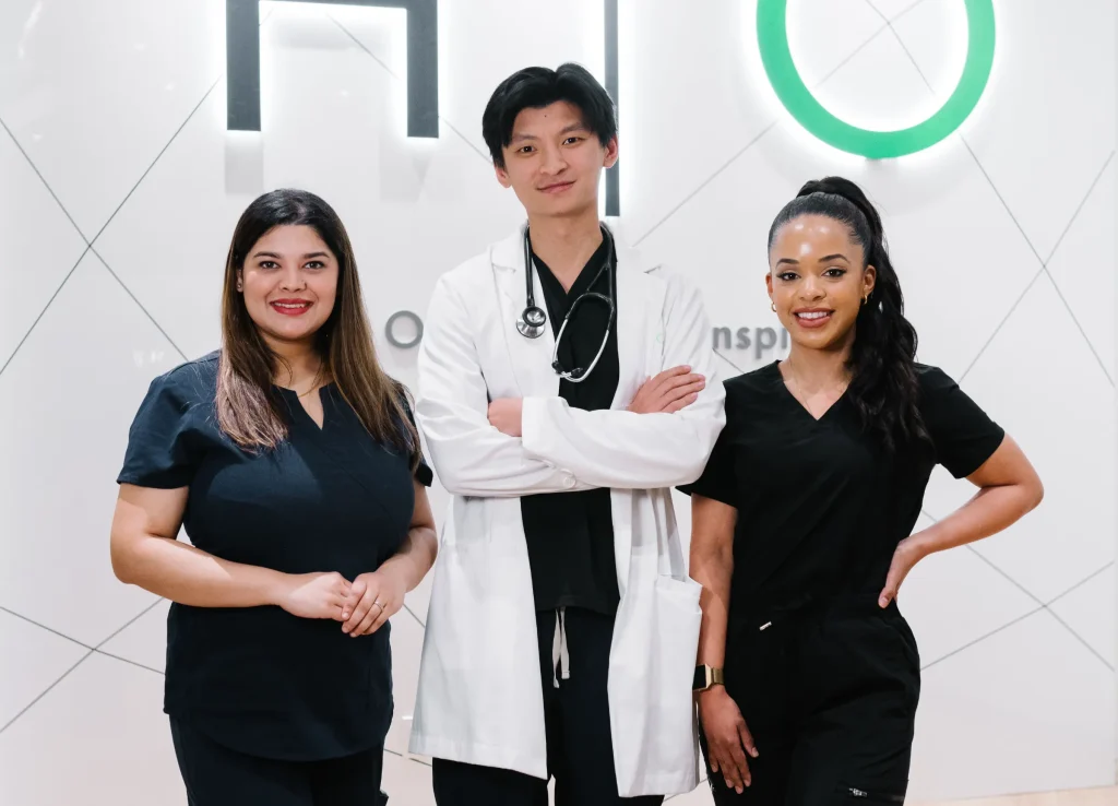 Medical wellness clinic practitioners smiling