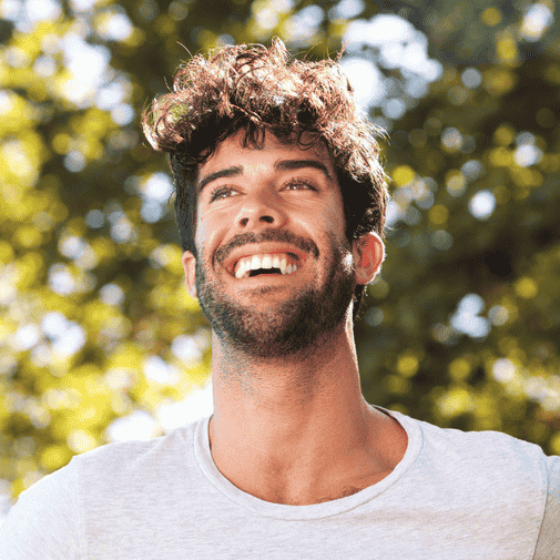 patient who fixed chipped tooth smiling