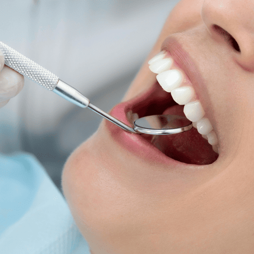 patient being examined if they need a root canal